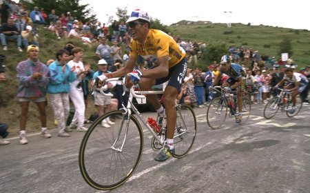 Subir sentado, como Miguel Indurain