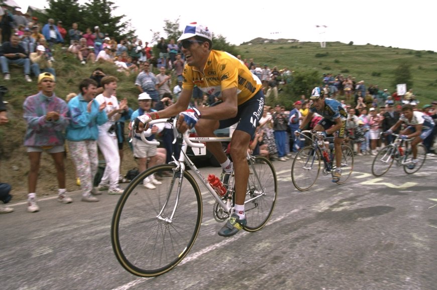 Subir sentado, como Miguel Indurain